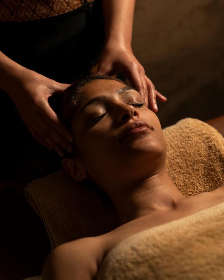 Grand Ocean El Sokhna Hotel Ain Sukhna Exterior photo A woman receiving a facial massage